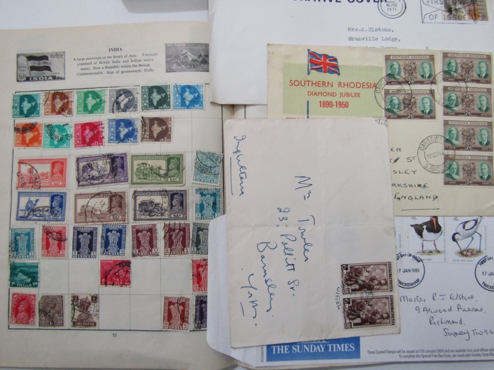 Two albums containing a collection of early 20th century onwards British and world wide stamps