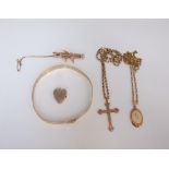 A collection of 9ct gold items to include a curb link chain with 9ct cross, a chain link necklace