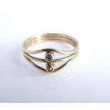 A late 20th century 9ct gold and diamond ladies ring set with two single cut diamonds, 3.0 g, ring