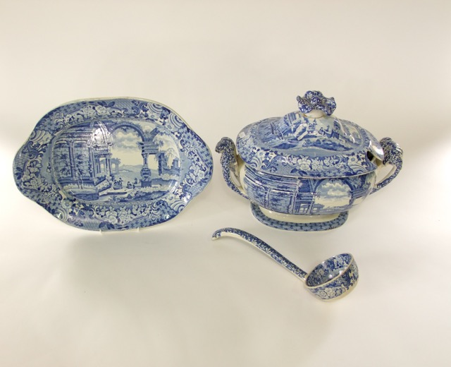 A large early 19th century blue and white transfer printed two handled soup tureen, cover, stand and