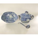 A large early 19th century blue and white transfer printed two handled soup tureen, cover, stand and