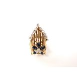 A 1970s 14k gold ladies dress ring of abstract design numerously set with single cut diamonds and