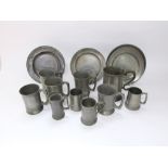 A collection of ten pewter tankards and three pewter plates (13)