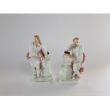 A pair of 19th century Derby figures of Milton and Shakespeare both standing beside columns,
