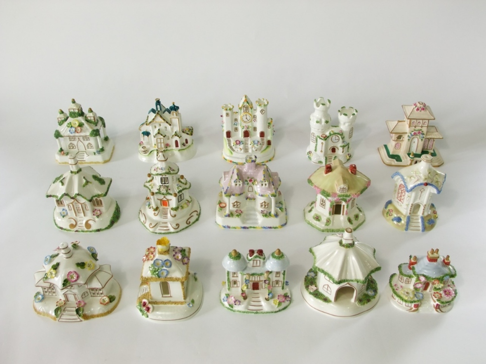 A collection of fifteen Coalport model cottages, all in the 19th century manner including Twin