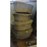 Four stone, probably mill related, grinding wheels (slight variant in size)