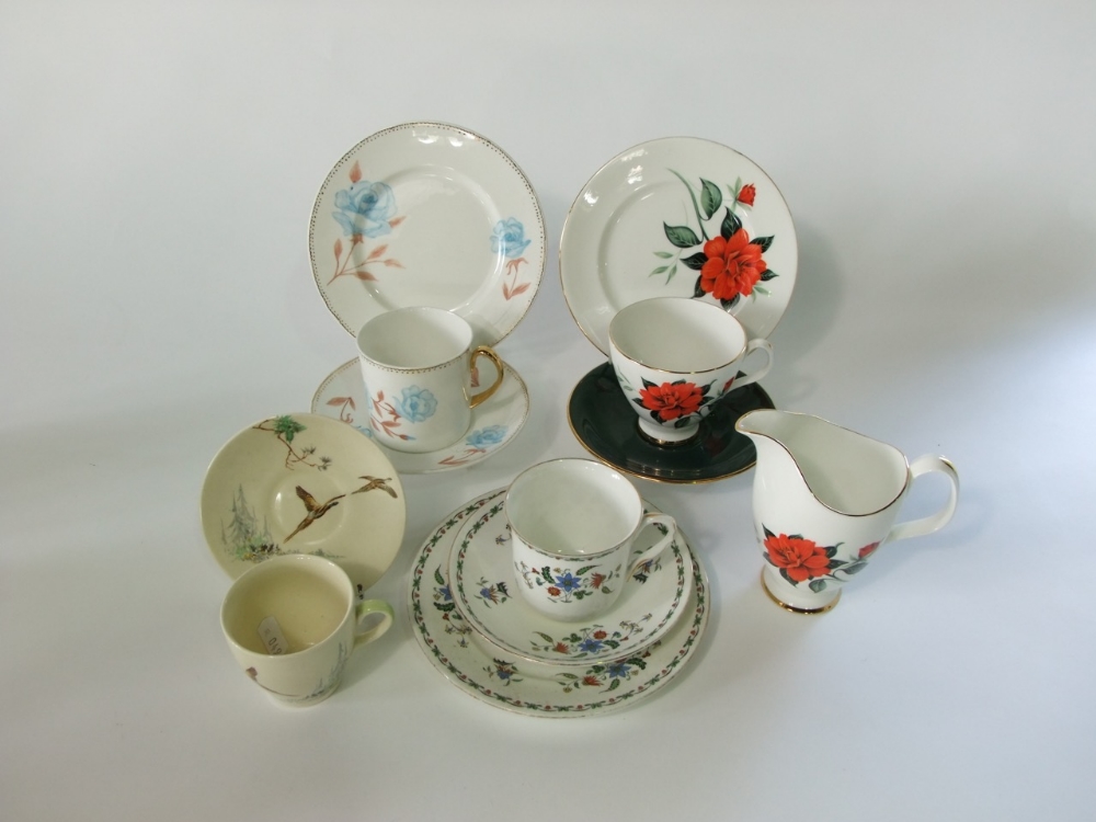 A small collection of Shelley coffee cans and saucers with painted blue rose decoration comprising - Image 2 of 2