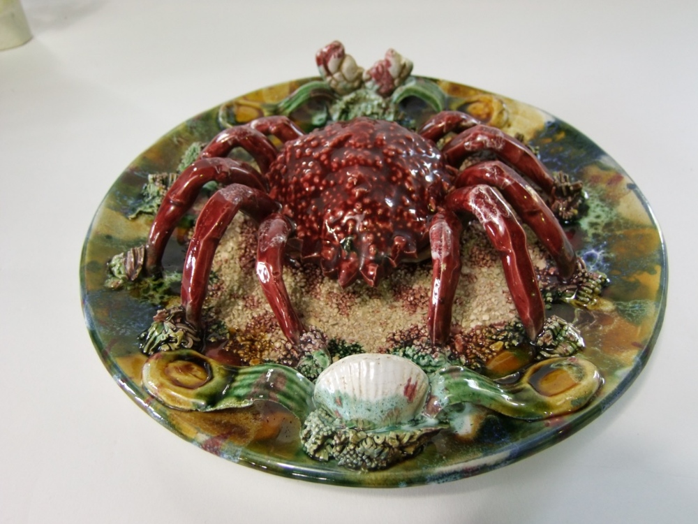 A continental dish with relief moulded and painted decoration incorporating a large crab, shells, - Image 2 of 2