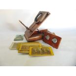 A Victorian mahogany magnifier frame (lacks lens) together with a collection of stereoscope slides