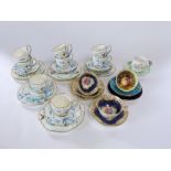 A collection of Victorian Ainsleys tea wares of fluted form with painted and gilded butterfly and