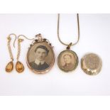 A 9ct gold memorial pendant set with split pearls and turquoise cabochons together with an