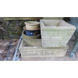 Five contemporary cast composition stone garden planters of varying design, two others, a pair of