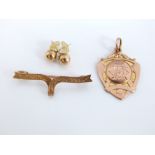3 x 9ct gold items to include a pin brooch, spherical stud earrings and a swimming medal 11.4g