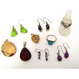 A collection of sterling silver jewellery to include four paste set rings, three pairs of gem set