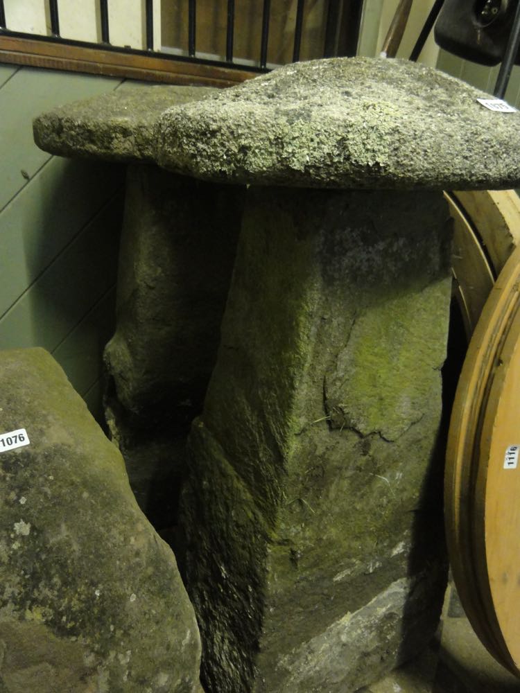 A pair of substantial weathered stone saddle stones and caps, 95 cm high approx. - Image 2 of 2