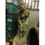 A reconstituted weathered figure of a bathing maiden, 1 metre tall approx.