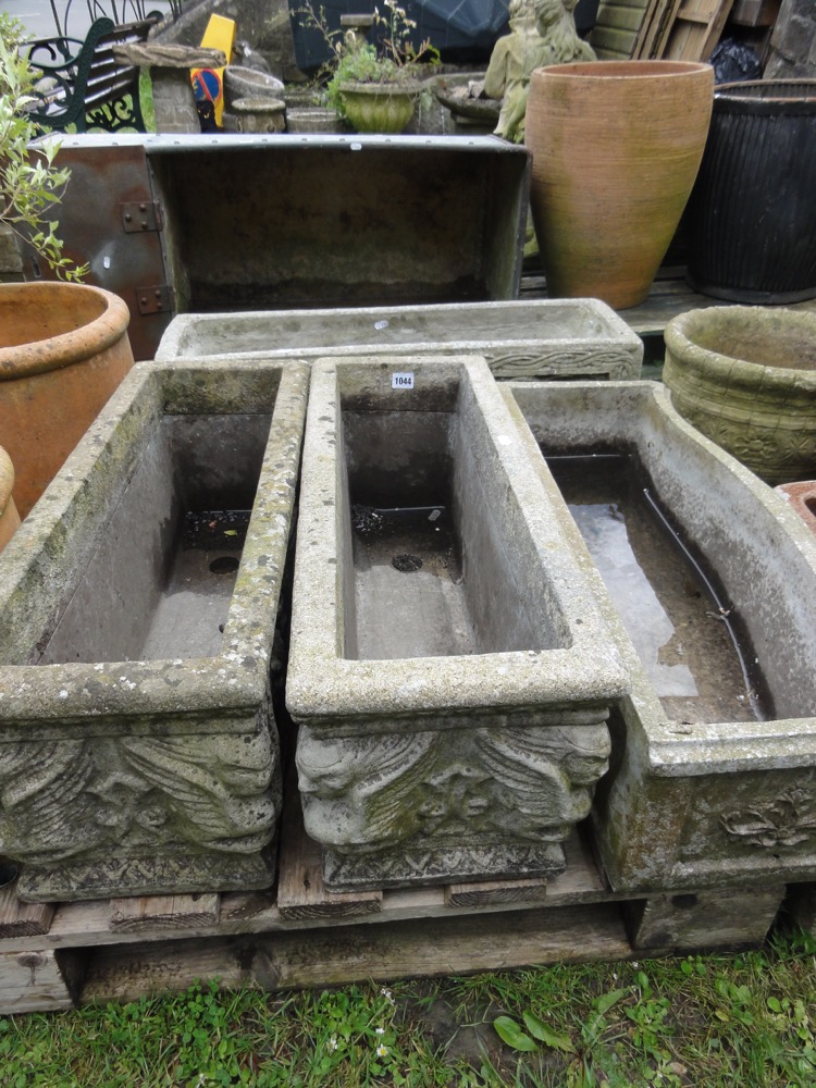 Four various weathered reconstituted garden planters, all with decorative panels, 70 cm long - Image 2 of 2