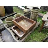 Two 19th century salt glazed shallow sinks or planters, two 19th century buff coloured clay