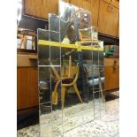 Art Deco period bevelled glass overmantle mirror of geometric form, 123 cm x 81 cm