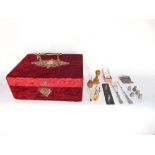 Antique red velvet sewing box with silk lined interior and a collection of various silver and