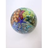 Peter Raos glass paperweight with nautical theme canes