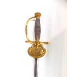 Victorian crown court sword with gilt handle mounted by a crown knop and Wilkinson steel blade