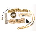 A collection of good quality costume jewellery to include a paste set white metal bracelet, a