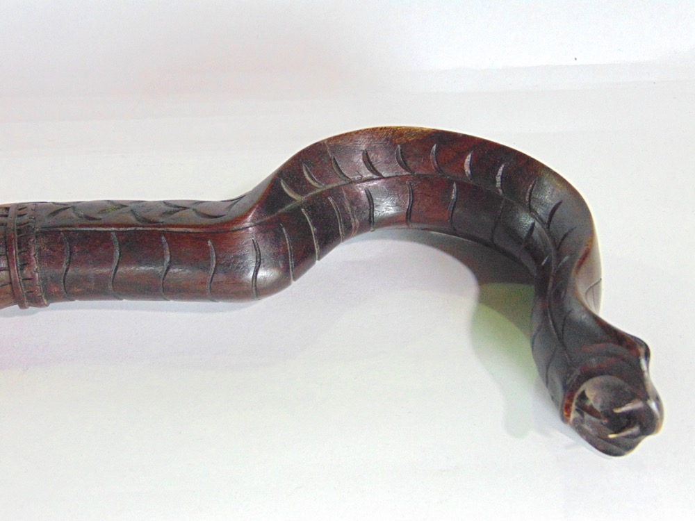 Eastern carved hardwood walking stick in the form of a Cobra, 100cm long