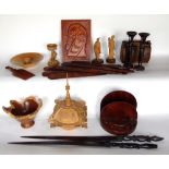 Large collection of Ethnic and Eastern treen to include page turners, figures, plaques, etc