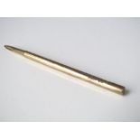 A 9k gold pencil retailed by Aspreys 9cm, 6.7g