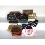 Collection of vintage fashion wear to include two cases fitted with vintage clothing, further