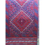 Meshwani runner decorated with red and blue diamonds, 241 x 64cm