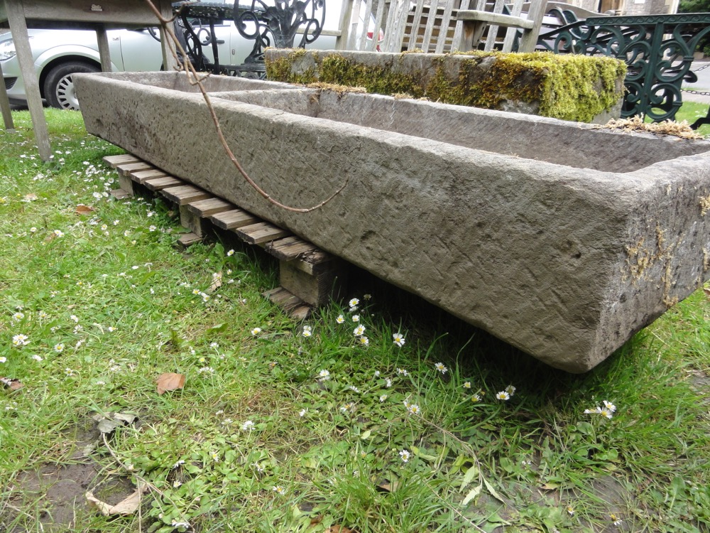 A good quality weathered limestone two divisional feeding trough, 220 cm long x 50 cm wide approx.