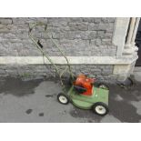 A Hayter Hayterette rotary mower with a 3.5 horse power Briggs & Stratton engine.