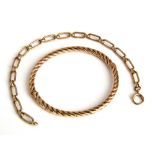 A 9k gold cable link bracelet 9g, 20 cm, together with a rope twist bangle in unmarked yellow