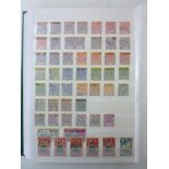 A stockbook containing a collection of GB Commonwealth stamps from QV to modern (displayed in