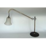 A Benson type brass desk lamp with frosted glass shade and articulated arm.