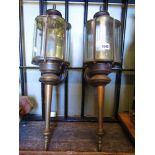 A pair of brass exterior lanterns in the form of coaching lamps.
