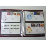 Five albums containing a large quantity of FDCs and some Royal Mail Mint Stamp collections