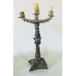 An unusual three tier candelabra in the manner of Palissy of Portugal, the central column