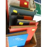 Eight stock books containing a collection of stamps from Singapore, India, South Africa and Ceylon.