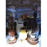 A collection of Devon pottery jugs, salt glazed ware, two timber table lamps, small amount of