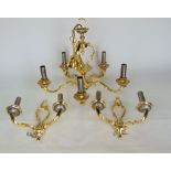 A cast polished gold coloured metal 5 branch electrolier, together with a pair of matching 2