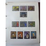 Two Stanley Gibbons Great Britain stamp albums, together with two FDC albums which include a