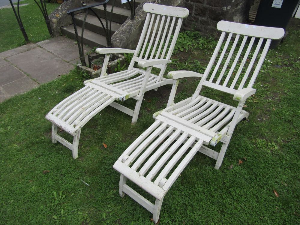 A pair of teak steamer type folding garden armchairs with slatted seats and backs (later painted - Image 2 of 2