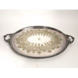 Large silver plated twin handled tray, cast with scrolled acanthus and darted borders, the bowl