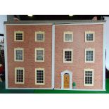 A large dolls manor house with plaque inscribed 'Howley Court' together with an extensive collection