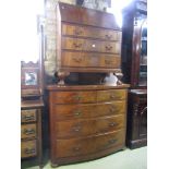 Mid 20th century mahogany veneered writing bureau the fall flap over three long drawers on a short