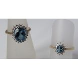 Two 9ct gold rings set with diamonds and blue cubic zirconia