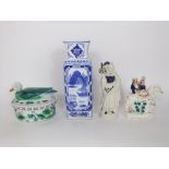 A reproduction oriental vase with blue and white decoration, 38 cm tall, a reproduction oriental